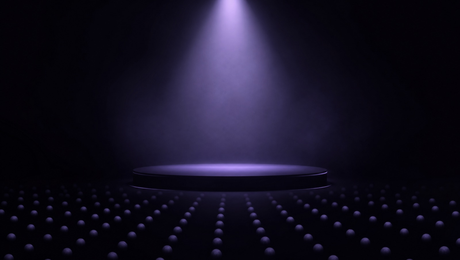 Foco de luz lavanda iluminando un escenario minimalista oscuro, representación de una ponencia de inteligencia artificial